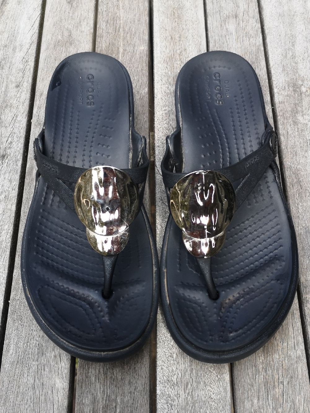 Crocs thong sandals with decorative metallic circles